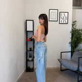 Jeans chiaro con strappi 5083