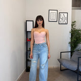 Jeans chiaro con strappi 5083