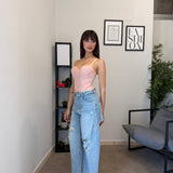 Jeans chiaro con strappi 5083