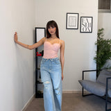 Jeans chiaro con strappi 5083